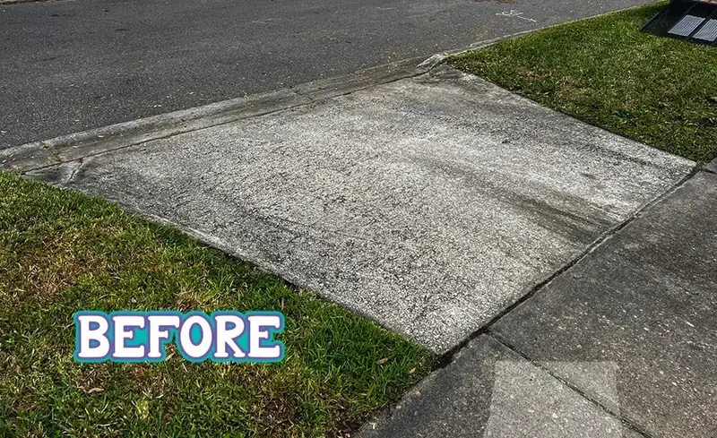 Concrete driveway before cleaning